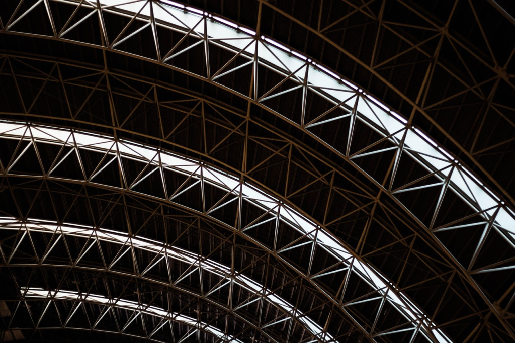 symmetrical, building, airport, architecture, modern, symmetric, urban, office, city, skyscraper, apartment, business, sky, nature, symmetry, tower, high, blue, exterior, construction, district, structure, window, cityscape, reflection, blue sky, geometric, day, travel, downtown, design, front, facade, light, glass, landscape, pattern, black business, black office, black city, black travel, black landscape, black building, black construction, black window, black glass, black pattern, black company, black glasses